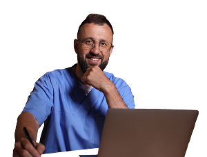 Healthcare professional working on a laptop