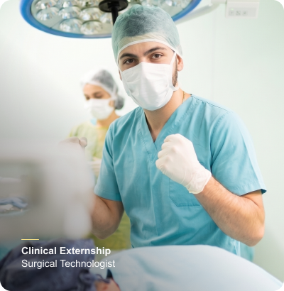 Excited surgical technologist working at his externship. 